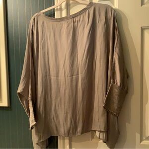 Blousy tunic looks great in a summer breeze or on the dance floor.